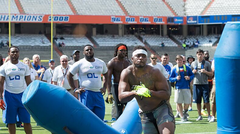 Dante Fowler, Jr. knocks down a bag as he runs through drills during the Pro Scout Day at the University of Florida NFL Combine in Gainesville, FL, Tuesday, April, 7, 2015. (AP Photo/Phil Sandlin) Former Florida pass rusher Dante Fowler is one player the Falcons have interest in. (AP photo