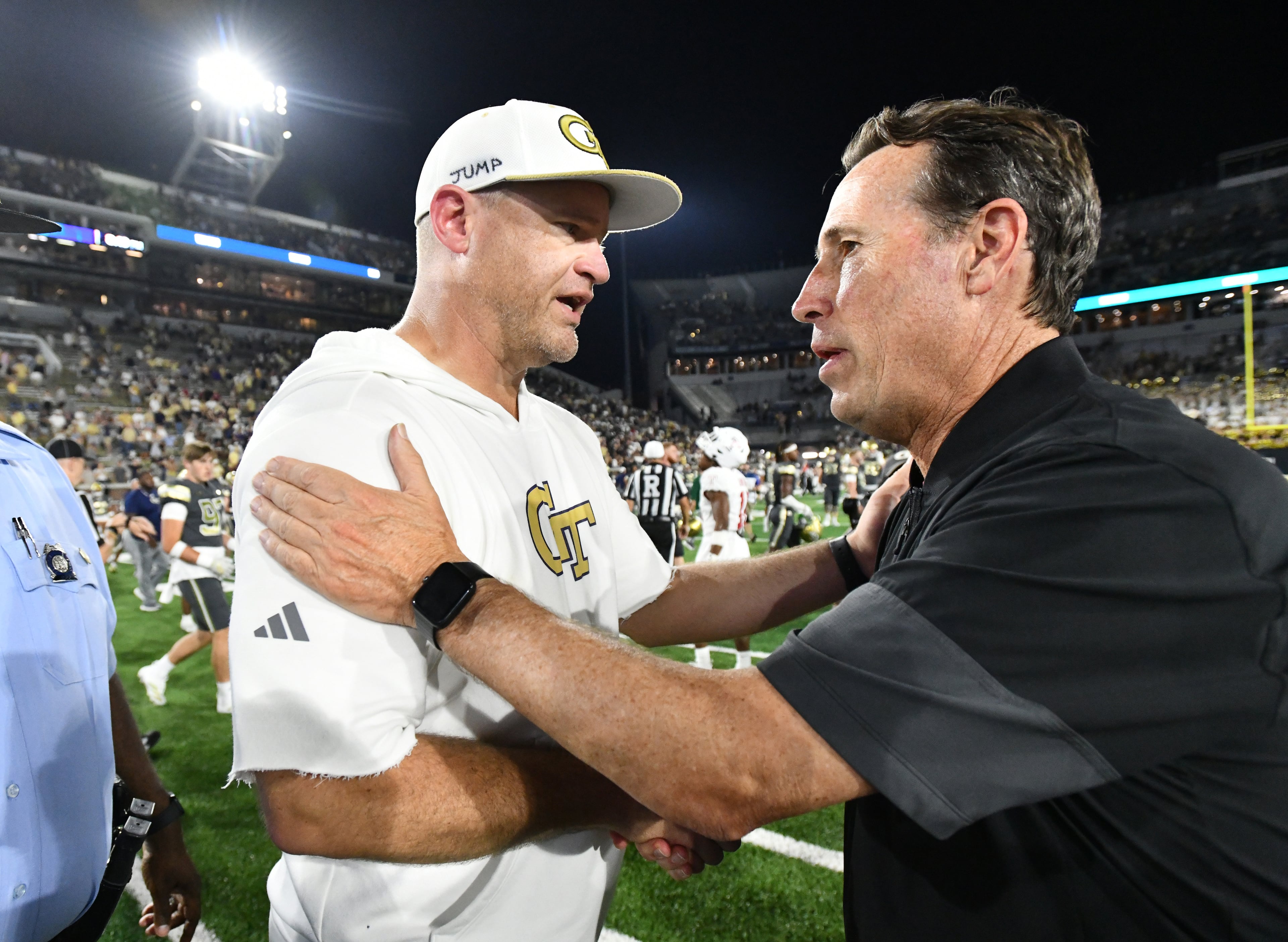 Georgia Tech head coach Brent Key and Temple head coach K.C. Keeler shake hands after Georgia Tech beat Temple during an NCAA college football game at Georgia Tech's Bobby Dodd Stadium, Saturday, November 20, 2025 in Atlanta. Georgia Tech won 45-24 over Temple. (Hyosub Shin / AJC)