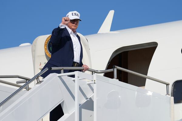 President Donald Trump boards Air Force One at Morristown Municipal Airport in Morristown, N.J., Sunday, July 6, 2025, en route to Washington. (AP Photo/Jacquelyn Martin)
