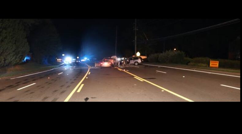 Two children died in a three-car crash in Norcross, police said.
