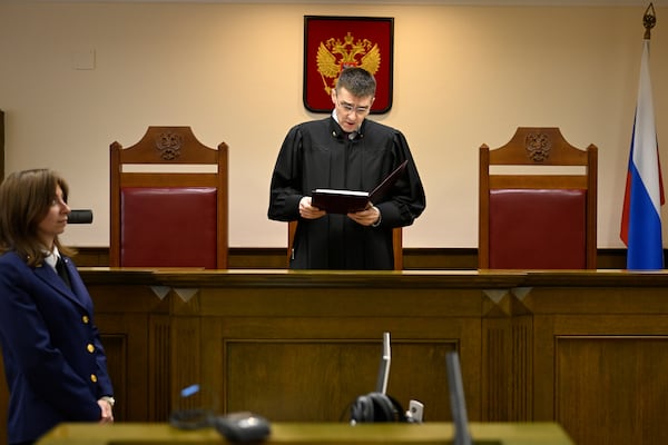 Russia's Supreme Court judge Oleg Nefyodov delivers a verdict lifting a ban on Afghanistan's Taliban, who were designated as a terrorist group more than two decades ago, in Moscow, Russia, Thursday, April 17, 2025. (AP Photo/Dmitry Serebryakov)