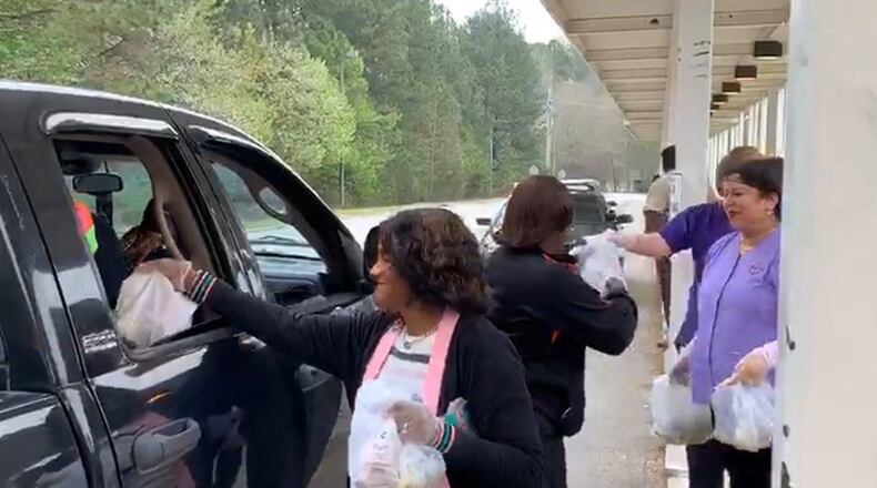 Food being handed out at a local school.