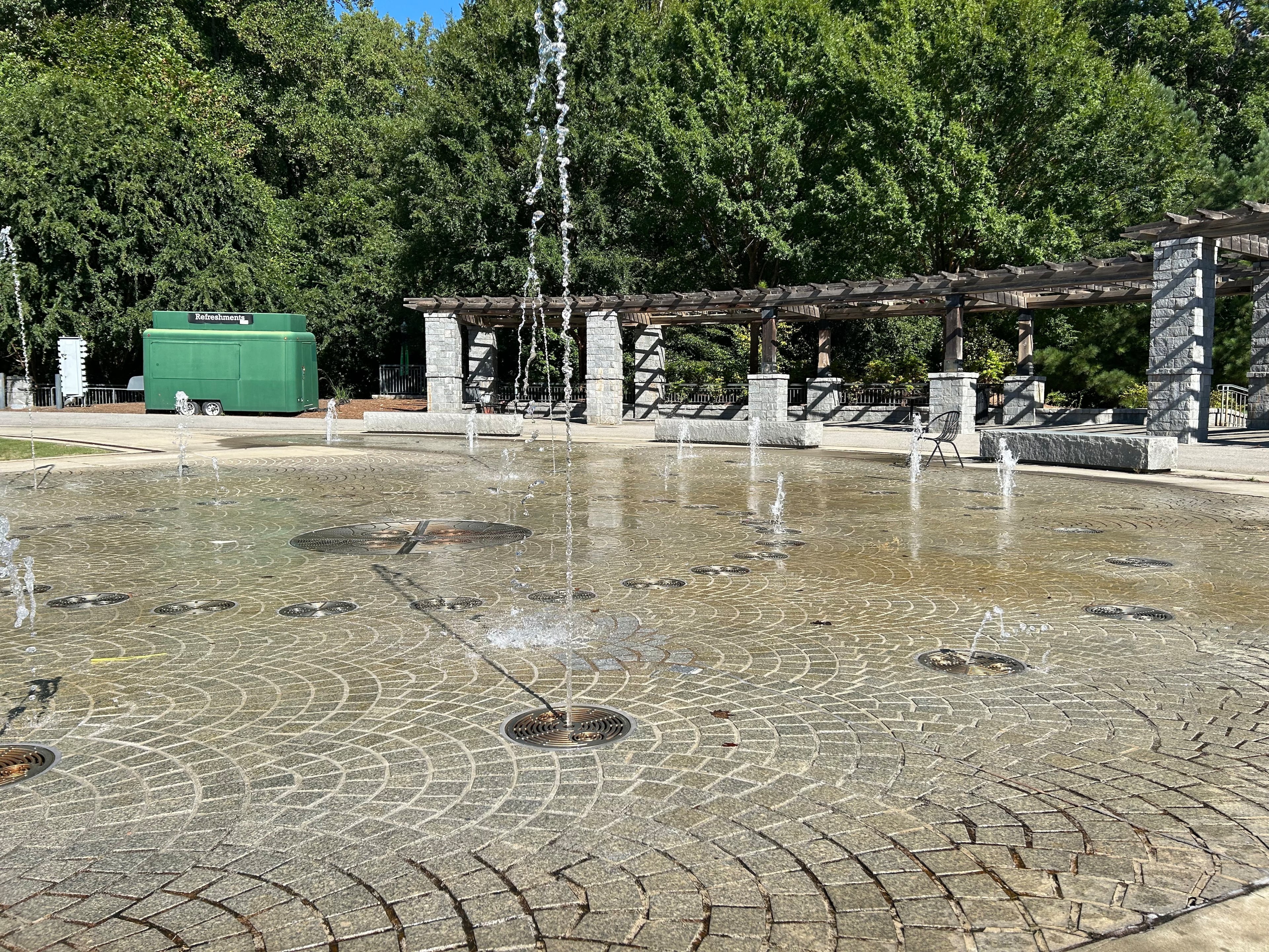 Around 10:30 on a cool Wednesday morning, exactly zero people were using the splash pad at Piedmont Park. (Thomas Lake/AJC)
