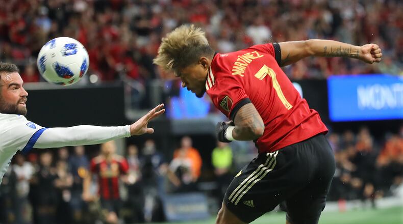 April 28, 2018 Atlanta: Atlanta United forward Josef Martinez gets a header for a shot on goal against the Montreal Impact during the second half in a MLS soccer game on Saturday, April 28, 2018, in Atlanta. Curtis Compton/ccompton@ajc.com