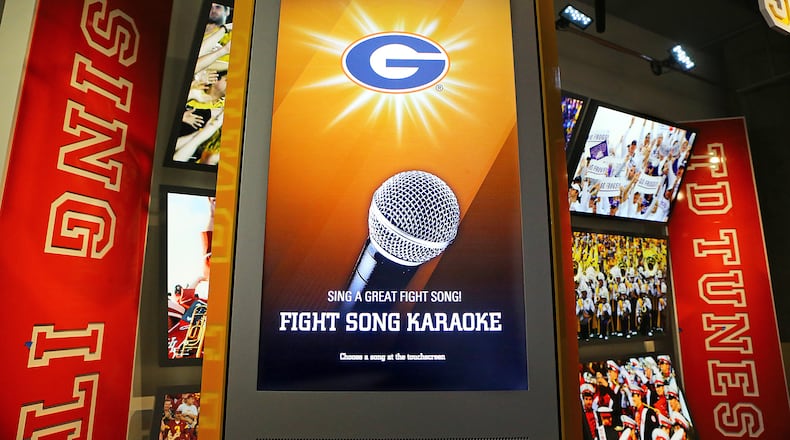 Fans can offer their best renditions of their favorite team’s fight song in a karaoke challenge. CURTIS COMPTON / CCOMPTON@AJC.COM