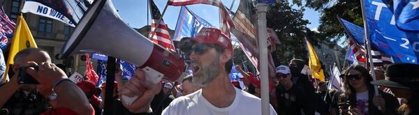 November 21, 2020 Atlanta - Pro-Trump protesters, some with flags and signs, attend a rally against the results of the U.S. presidential election outside the Georgia State Capitol on Saturday, November 21, 2020. Several different groups converged at the Capitol for a rally to show support for and against President Donald Trump. (Photo: Hyosub Shin / Hyosub.Shin@ajc.com)