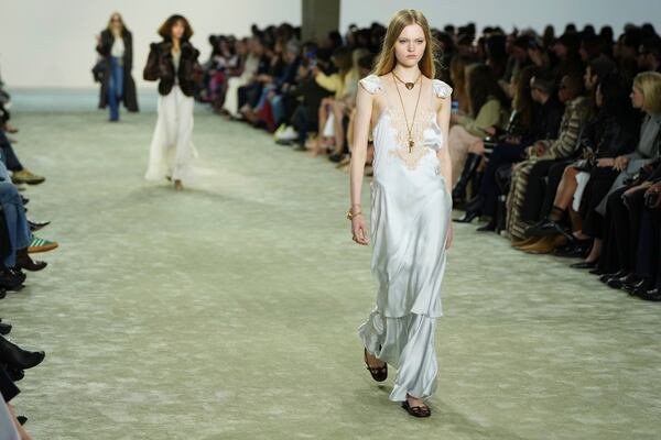 A model wears a creation as part of the Chloe Fall/Winter 2025-2026 Womenswear collection presented Thursday, March 6, 2025. in Paris. (Photo by Scott A Garfitt/Invision/AP)