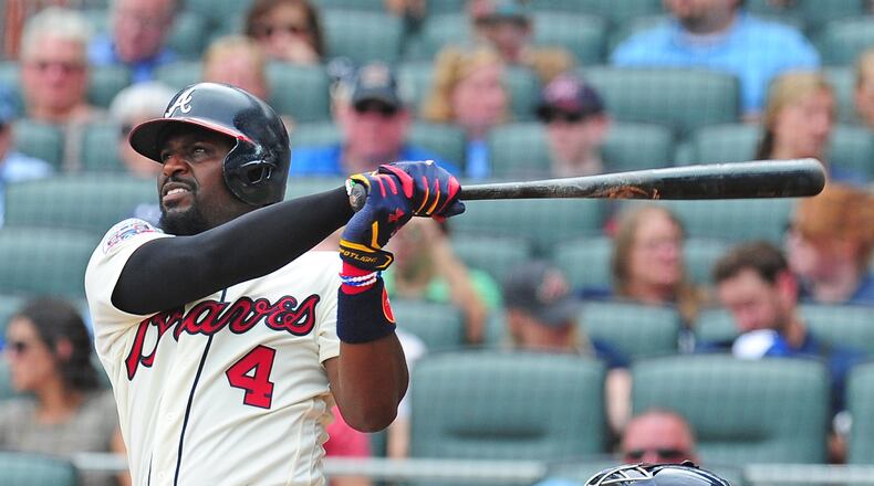 Brandon Phillips #4 of the Atlanta Braves hits a third inning two-run home run against the Milwaukee Brewers at SunTrust Park on June 24, 2017 in Atlanta, Georgia. (Photo by Scott Cunningham/Getty Images)