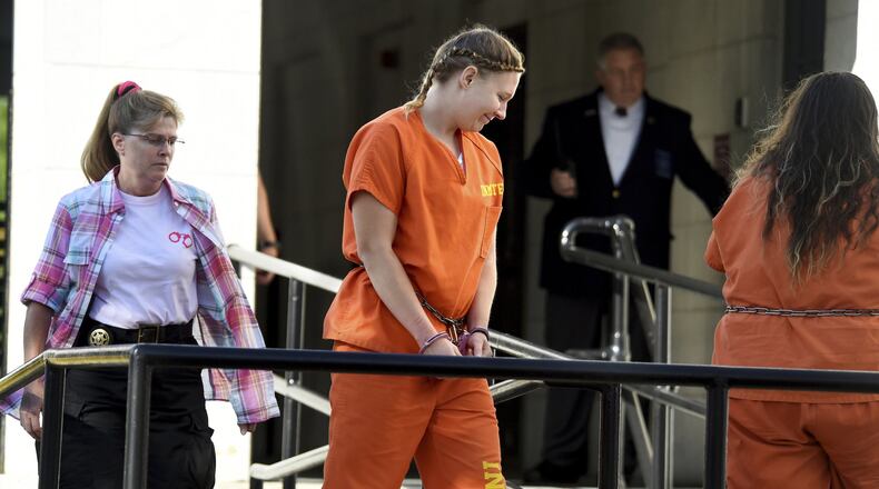 Reality Winner, charged with leaking a top-secret government document to a news outlet, walks into the federal courthouse in Augusta, Ga., Tuesday, June 26, 2018. (Michael Holahan/The Augusta Chronicle via AP)