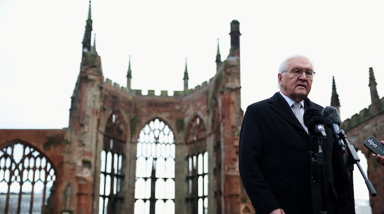Germany's President Frank-Walter Steinmeier speaks to the media on the grounds of the old Coventry Cathedral, in Coventry, England, Friday, Dec. 5, 2025, on the final day of the state visit to the UK. (Hannah McKay/Pool Photo via AP)