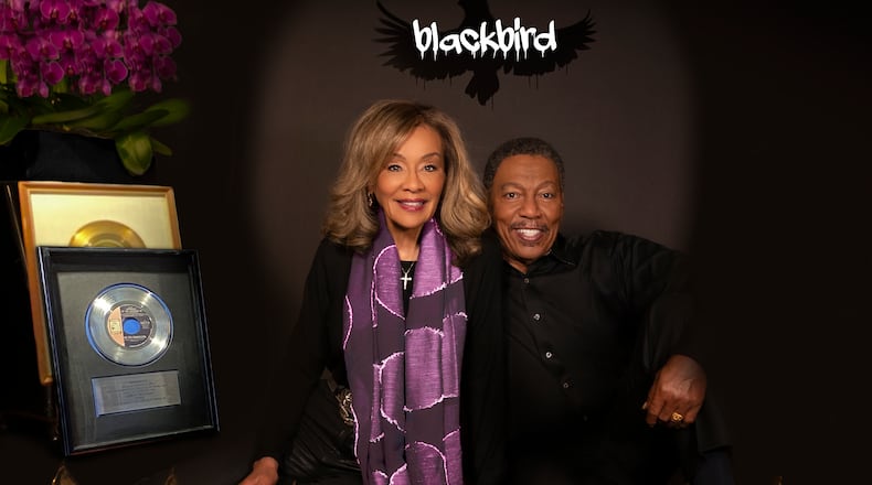 Marilyn McCoo and Billy Davis Jr. pose with Grammys and RIAA Record Awards. Courtesy of Guttman PR.