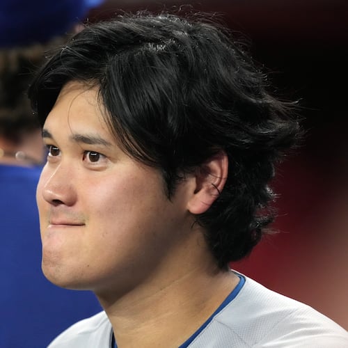 Los Angeles Dodgers two-way player Shohei Ohtani (17) against the Arizona Diamondbacks in the first inning of a baseball game, Friday, Aug 7, 2026, in Phoenix. (AP Photo/Rick Scuteri)
