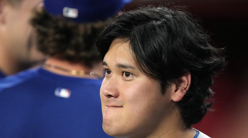 Los Angeles Dodgers two-way player Shohei Ohtani (17) against the Arizona Diamondbacks in the first inning of a baseball game, Friday, Aug 7, 2026, in Phoenix. (AP Photo/Rick Scuteri)
