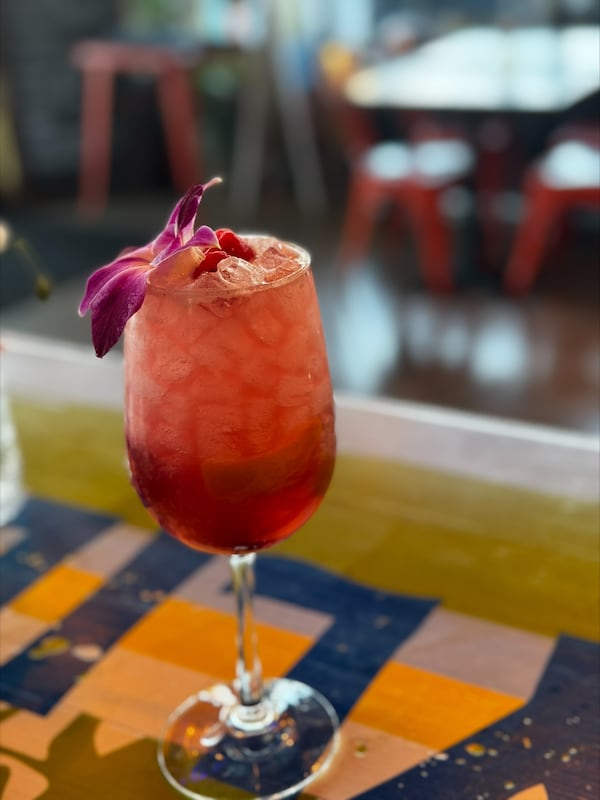 Pomegranate, pineapple and raspberry get a topper of sparkling wine in Wylie and Rum's vodka-based spritzer. (Courtesy of Wylie & Rum)