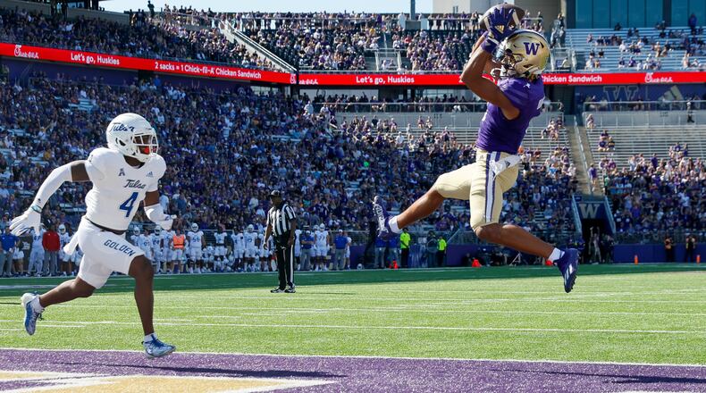 Washington wide receiver Rome Odunze, right, beats Tulsa cornerback Tyree Carlisle for a 2-yard touchdown catch during the first quarter at Husky Stadium on Saturday, Sept. 9, 2023, in Seattle. (Jennifer Buchanan/The Seattle Times/TNS)