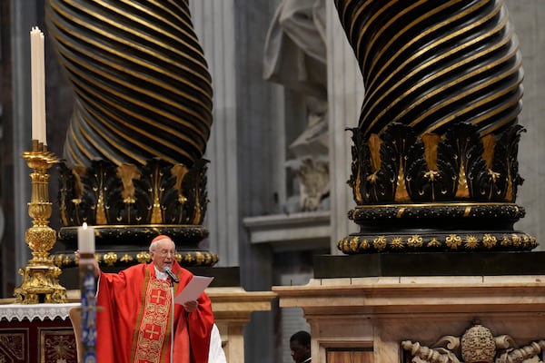 Cardinal Giovanni Battista Re celebrates a final Mass with cardinals inside St. Peter's Basilica, before the conclave to elect a new pope, at the Vatican, Wednesday, May 7, 2025. (AP Photo/Gregorio Borgia)