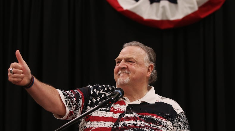 Cobb County Sheriff Neil Warren addresses the crowd during the 30th annual Cobb Sheriff’s Corn Boilin’ at Jim Miller Park in Marietta, Georgia on Monday, July 15, 2019. Christina Matacotta/Christina.Matacotta@ajc.com