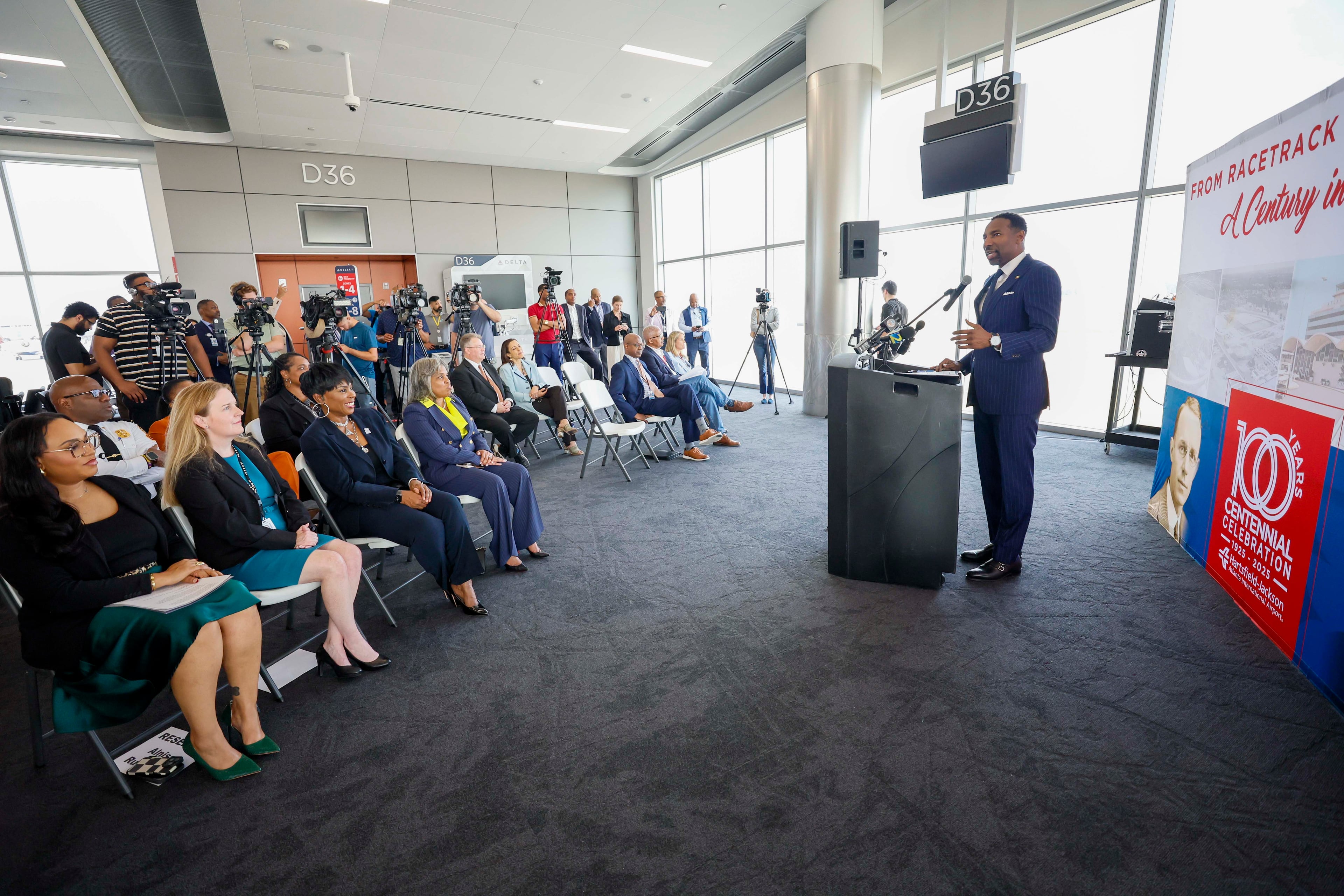 Atlanta Mayor Andre Dickens delivers remarks during the ribbon-cutting ceremony marking the completion of Phase 2 of the Concourse D expansion at Hartsfield-Jackson Atlanta International Airport on Wednesday, Sept. 17, 2025. The world's busiest airport relies on federal funding for its capital expenditure projects — including this latest project set to last through 2029. (Miguel Martinez/AJC)