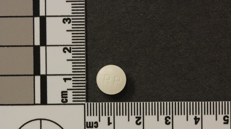 At least seven people have been hospitalized in Warner Robins after overdosing on what police believe was counterfeit Percocet. (Credit: Warner Robins Police Department)