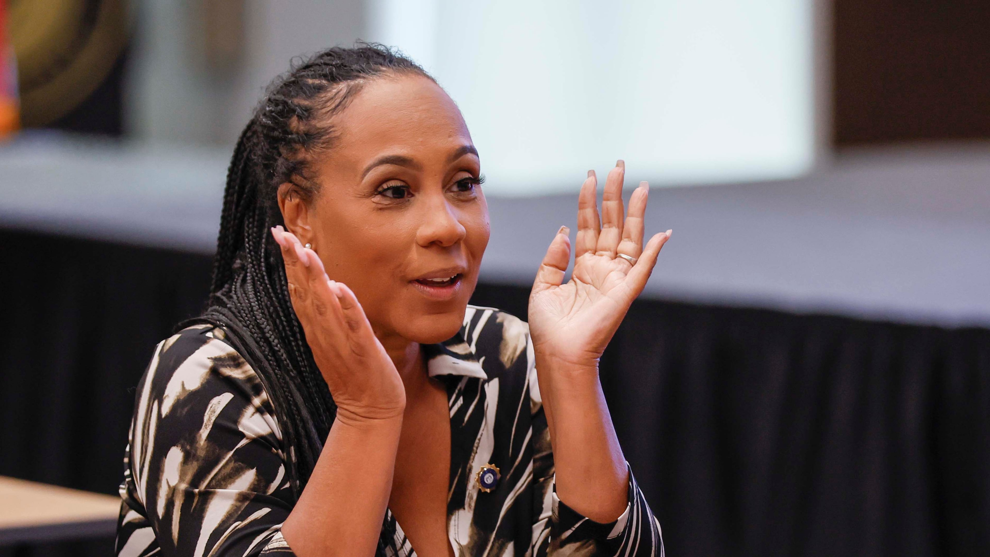 Fulton County District Attorney Fani Willis engages with others during the 2025 Court Watch Appreciation Luncheon held at the new Atlanta Public Safety Training Center on Tuesday, Sept. 2, 2025. Willis’ travel in 2022 and 2023 was under the microscope during a dramatic evidentiary hearing early last year. (Miguel Martinez/AJC)