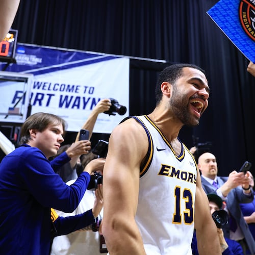 Senior Tyson Thomas celebrates Emory’s 72-58 win over Christopher Newport in the semifinals of the NCAA D3 championships in Fort Wayne, Ind., on March 21, 2026. (Jimmy Naprstek/Kodiak Creative via Emory University Athletics)