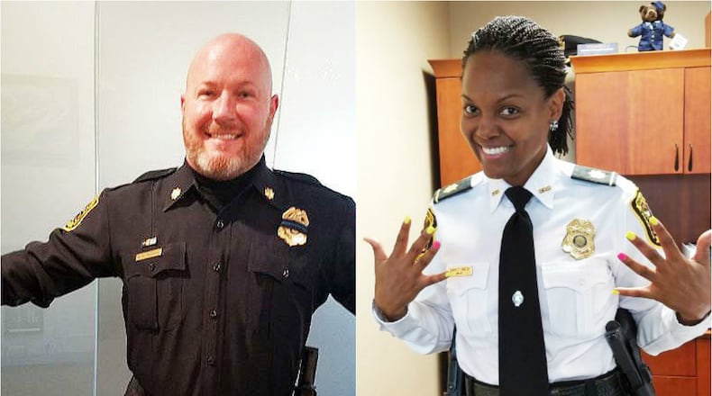 DeKalb County police, including Maj. Greg Padrick and Maj. Sonya Porter, took part in a fundraiser that had male officers grow beards and female officers were earrings and colorful nail polish to raise money for needy kids at Christmas. (Credit: DeKalb police)