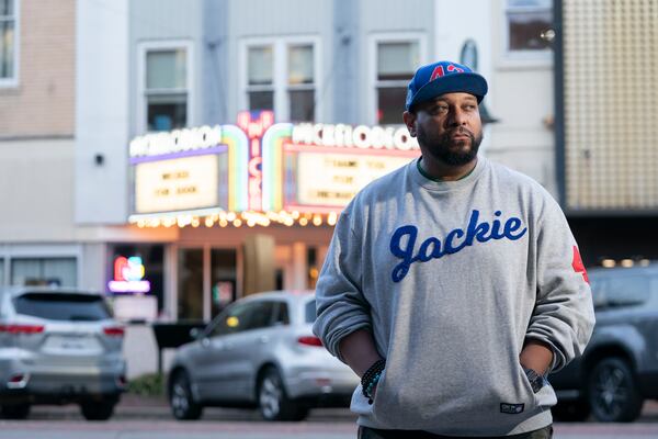 Preach Jacobs poses for a photo along Main Street near the Nickelodeon Theatre on November 25, 2025 in Columbia, South Carolina. (Sean Rayford for the AJC) 