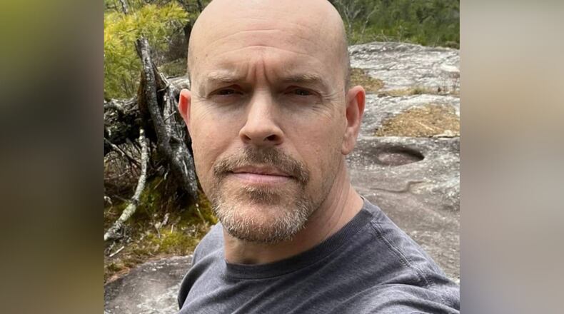 Deputy Jamie Reynolds of the Spalding County Sheriff's Office was killed Sunday morning after a large pine tree fell onto his vehicle as he drove on Ga. 16, according to the sheriff's office.