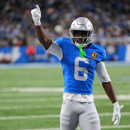 FILE - Detroit Lions cornerback Terrion Arnold reacts to a play against the Green Bay Packers during an NFL football game in Detroit, Nov. 27, 2025. (AP Photo/Paul Sancya, File)