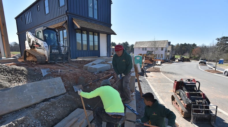 March 15, 2018 Fayetteville - Construction crews working on Pinewood Forest, a mixed-use development in Fayetteville. HYOSUB SHIN / HSHIN@AJC.COM