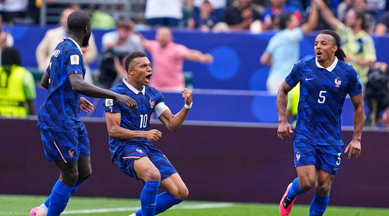 France's Kylian Mbappe (10) celebrates after scoring his team's first goal during the World Cup Group I soccer match between France and Iraq in Philadelphia, Monday, June 22, 2026. (AP Photo/Petr David Josek)