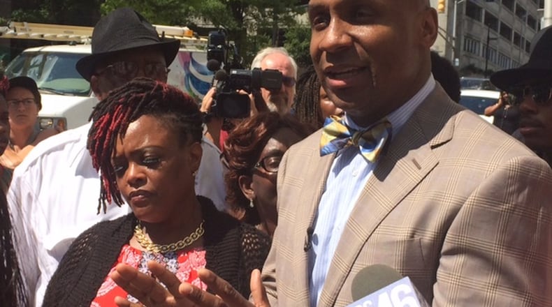 Alexia Christian’s mother, Felecia Christian, and her lawyer, Mawuli Davis, discuss the death of Alexia Christian. She was fatally shot by Atlanta police officers while under arrest in the back of a patrol car on April 30, 2015. Davis said the issue is not the police department’s official account but the lack of accountability and transparency. (Photo by Christian Boone/AJC)