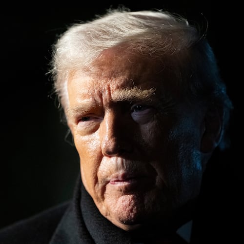 FILE - President Donald Trump speaks before departing on Marine One from the South Lawn of the White House, Jan. 20, 2026, in Washington. (AP Photo/Alex Brandon, File)