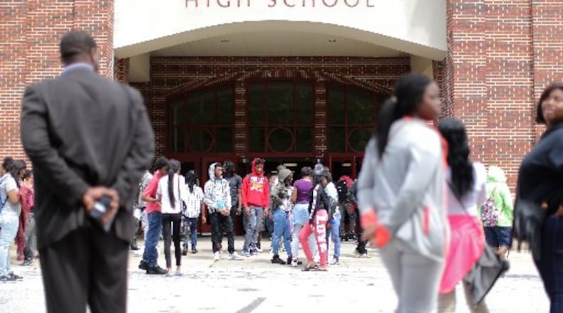 Students exit DeKalb County’s Ronald E. McNair High School after dismissal. (AJC FILE PHOTO)