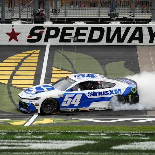 Ty Gibbs does a burnout after winning a NASCAR Cup Series auto race, Sunday, Aug. 9, 2026, at Iowa Speedway in Newton, Iowa. (AP Photo/Charlie Neibergall)
