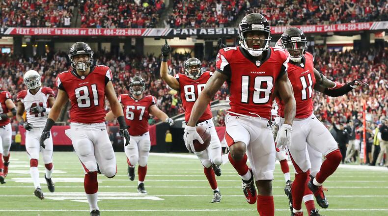 Falcons wide receiver Taylor Gabriel scores a 35-yard touchdown against the Cardinals for a 17-10 lead during the second quarter  Sunday, Nov. 27, 2016, in Atlanta.