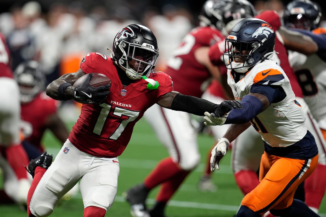Atlanta Falcons wide receiver Zachariah Branch (left) runs against Denver Broncos linebacker Que Robinson during the first half of a preseason NFL football game, Friday, Aug. 14, 2026, in Atlanta. (Mike Stewart/AP)