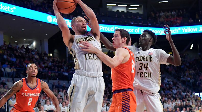 January 28, 2018 Atlanta - Georgia Tech guard Jose Alvarado (10) grabs a rebound over Clemson forward David Skara (24) during the second in a NCAA college basketball game at McCamish Pavilion in Atlanta on Sunday, January 28, 2018. Clemson won 72-70 over the Georgia Tech. HYOSUB SHIN / HSHIN@AJC.COM