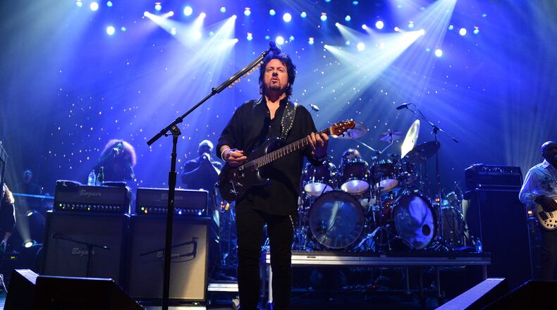 FILE PHOTO: Toto's Steve Lukather performs at the Hyperion Theater on January 25, 2013 in Anaheim, California. An artist has installed an MP3 player and speakers in the middle of an African desert to pay tribute to Toto's hit.