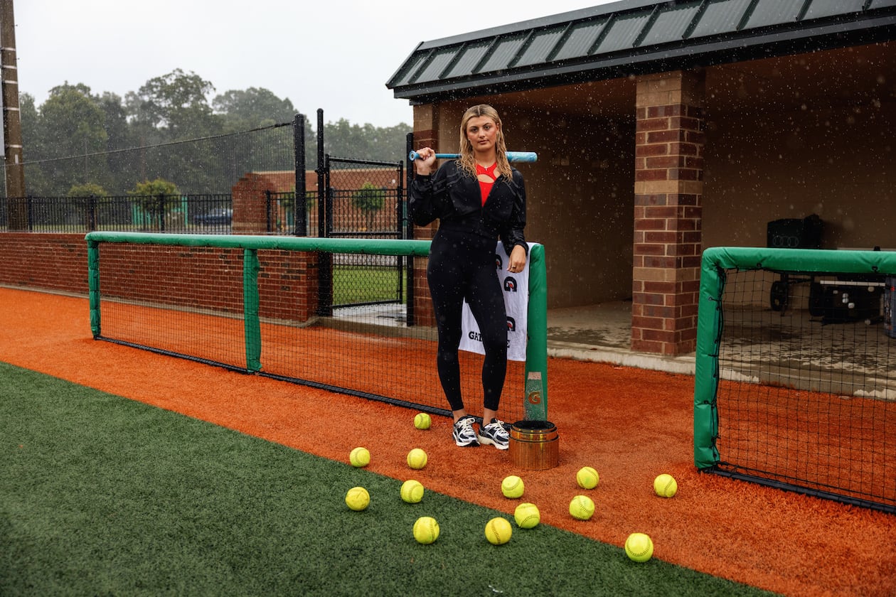 Former Buford standout pitcher Caroline Stanton was awarded the Gatorade National Softball Player of the Year trophy by softball legend Cat Osterman on Tuesday. (Joe Greer/Courtesy)