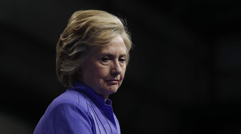 Donald Trump has called for an investigation of the Clinton Foundation, further intensifying scrutiny on the institution. Democratic presidential candidate Hillary Clinton sits on stage as Vice President Joe Biden speaks at a campaign event at Riverfront Sports in Scranton, Pa., on Aug. 15. (AP Photo/Carolyn Kaster)