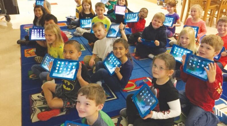 First graders in teacher Janeen Jepson’s class at Knox Elementary School in Canton participate in an Hour of Code, which encourages students to learn computer science. The Cherokee County schools have approved a partnership agreement with the city of Canton covering issues ranging from future growth to the shared use of Boling Park. CHEROKEE COUNTY SCHOOL DISTRICT