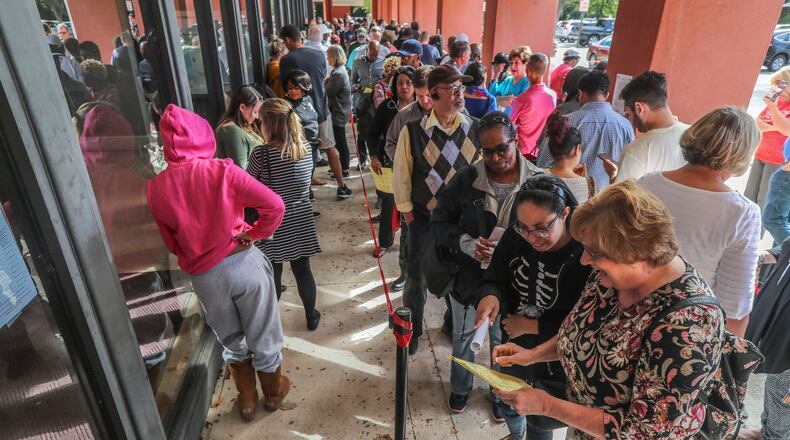 People lined up for early voting on Thursday Oct. 18, 2018 at the Cobb County West Park Government Center at 736 Whitlock Ave NW in Marietta JOHN SPINK/JSPINK@AJC.COM