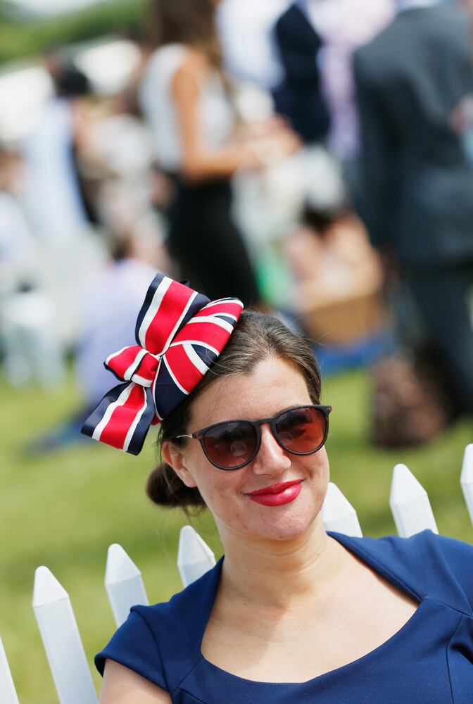 Race goers show hat styles