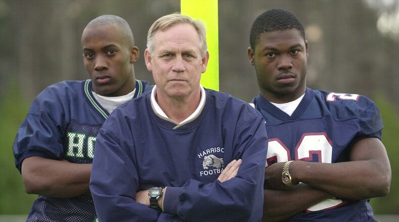011219 KENNESAW, GA. (NORTH COBB): In this Wednesday 12/19/01 photo we see, left to right, Harrison High's Paul Oliver , Cobb's defensive player of the year, Harrison High head coach Bruce Cobleigh , Cobb's football coach of the year, and Pebblebrook's Brent Thomas, Cobb's offensive player of the year. PHOTO BY ANDY SHARP/STAFF.
