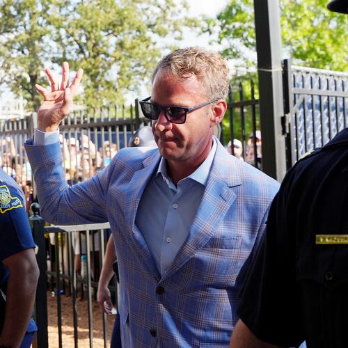 LSU football coach Lane Kiffin waves to fans as he enters the Vaught-Hemingway Stadium prior to an NCAA college football game against Mississippi in Oxford, Miss., Saturday, Sept. 19, 2026. (AP Photo/Rogelio V. Solis)