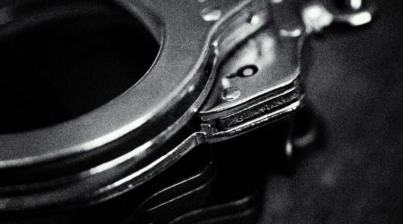 After an 18-year-old woman was killed June 24, a 19-year-old man surrendered to officials Wednesday.