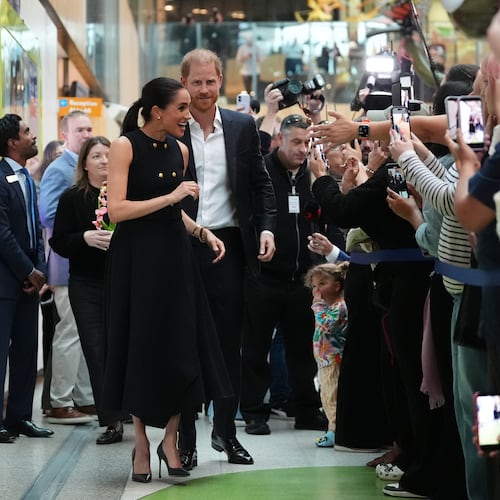 Britain's Prince Harry and Meghan Markle, the Duke and Duchess of Sussex, visit the Royal Children's Hospital Melbourne, Australia Tuesday, April 14, 2026. (Jonathan Brady/Pool Photo via AP)