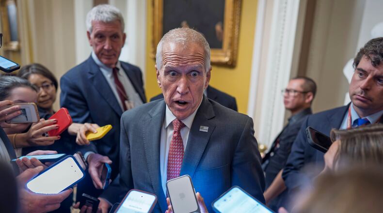 Sen. Thom Tillis, R-N.C., speaks to reporters as Republican senators arrive for a closed-door lunch at the Capitol in Washington, Tuesday, June 23, 2026, to prepare for a meeting with President Donald Trump Wednesday. (AP Photo/J. Scott Applewhite)
