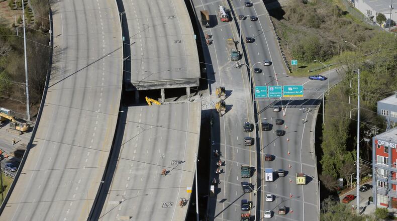 Aerial photo last Friday shows the portion of I-85 that collapsed after Thursday’s fire. BOB ANDRES /BANDRES@AJC.COM